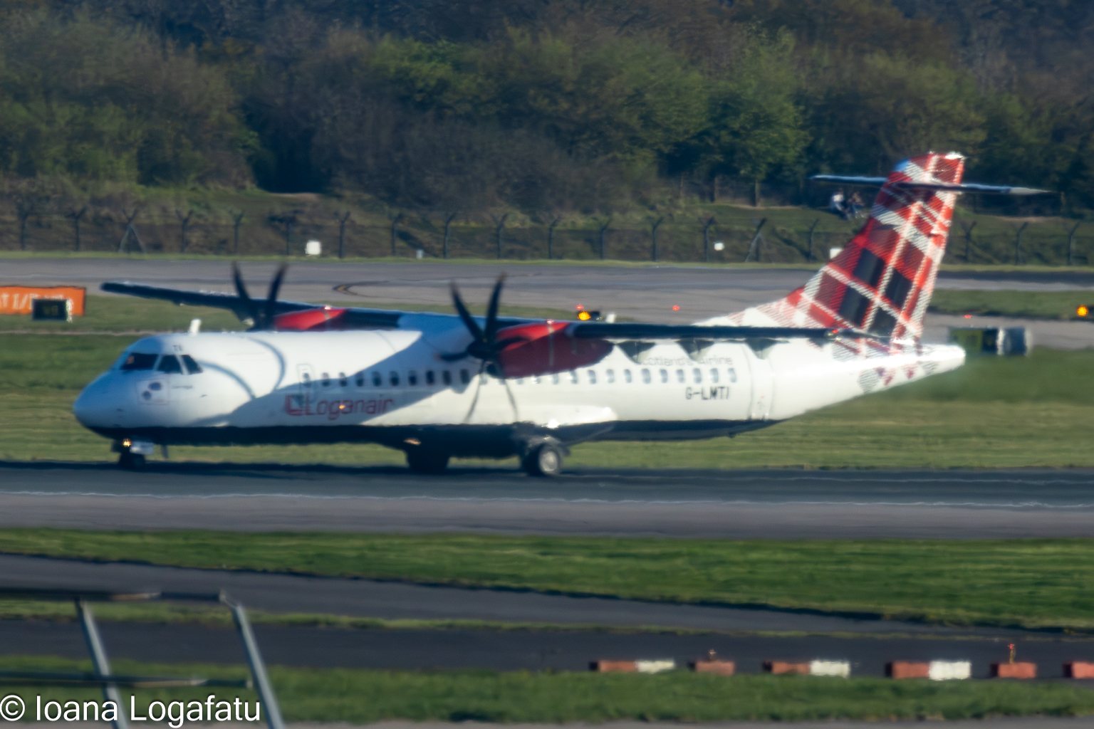 Aircraft preparing for takeoff on a sunny day